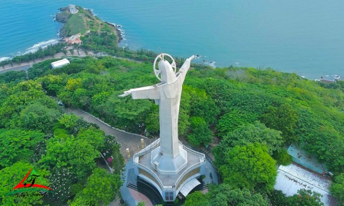 Statue of God with outstretched arms