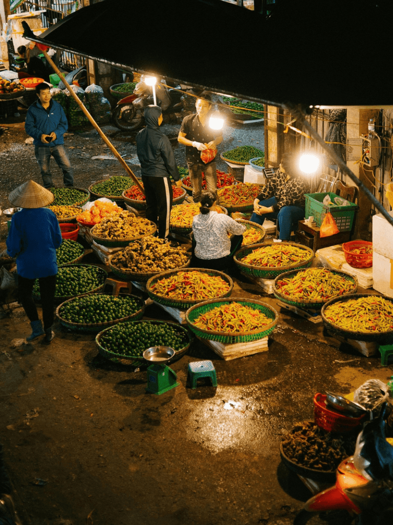 Long Bien Market is a very accessible destination for tourists, either on a motorcycle or by car. The entrance to the market faces toward Yen Phu Street.