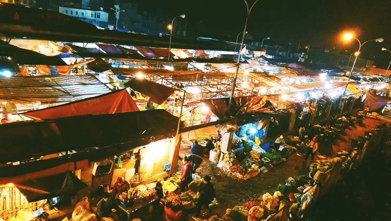 Explore nightlife at Long Bien Market