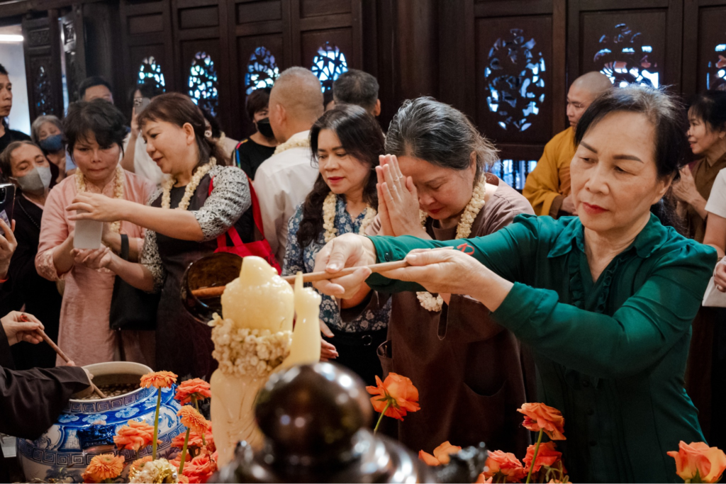 People gather at the pagoda to pray for luck and peace