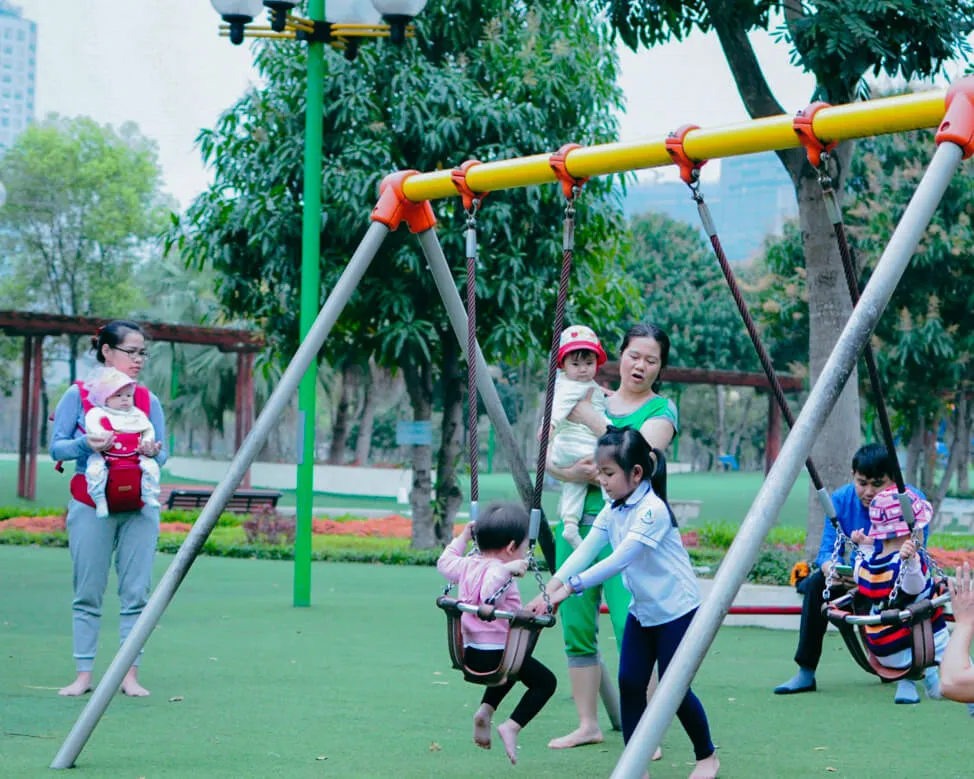 The playground has several equipments like slides and swing for kids