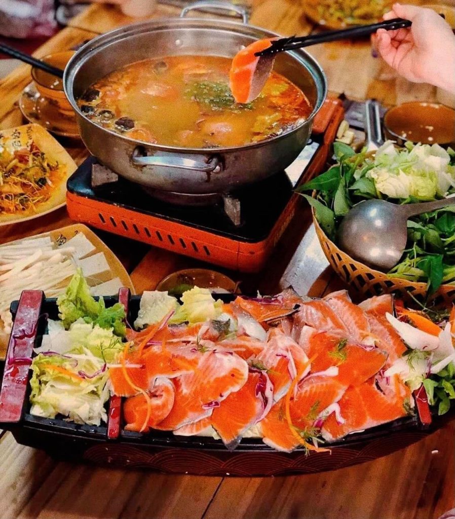 Savor salmon hotpot - Top thing to do in Lao Cai