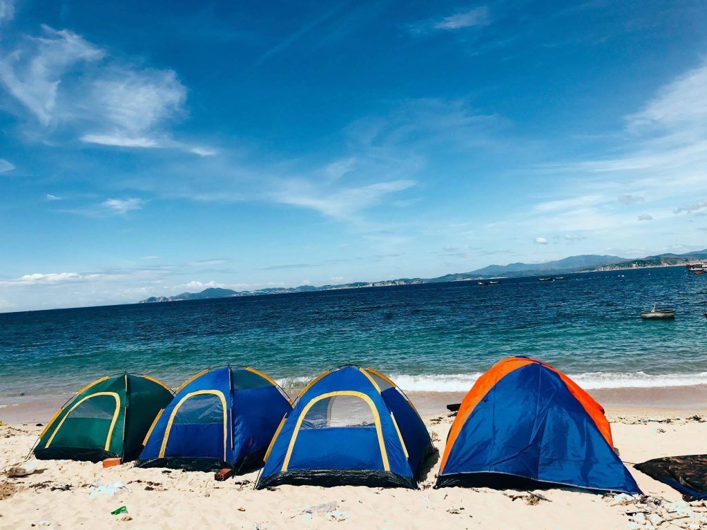 Bring your own tent or rent one from the locals to camp on the beach 