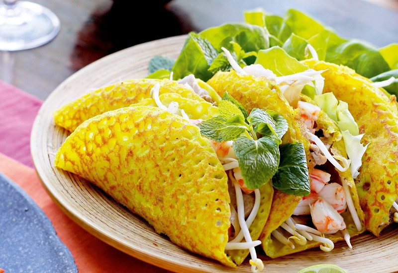 The Diep Son version of Banh Xeo is usually filled with small, sweet squid or shrimp caught 