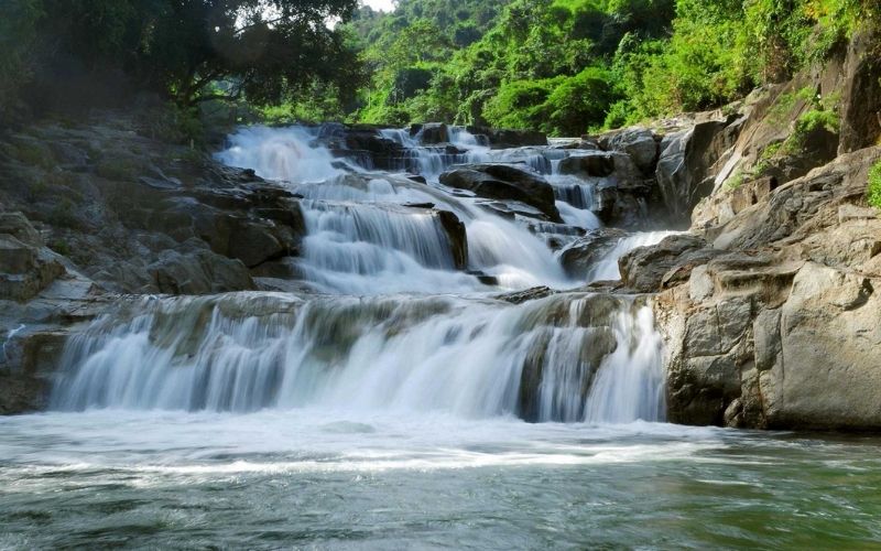 Why is Yang Bay waterfall worth visiting?