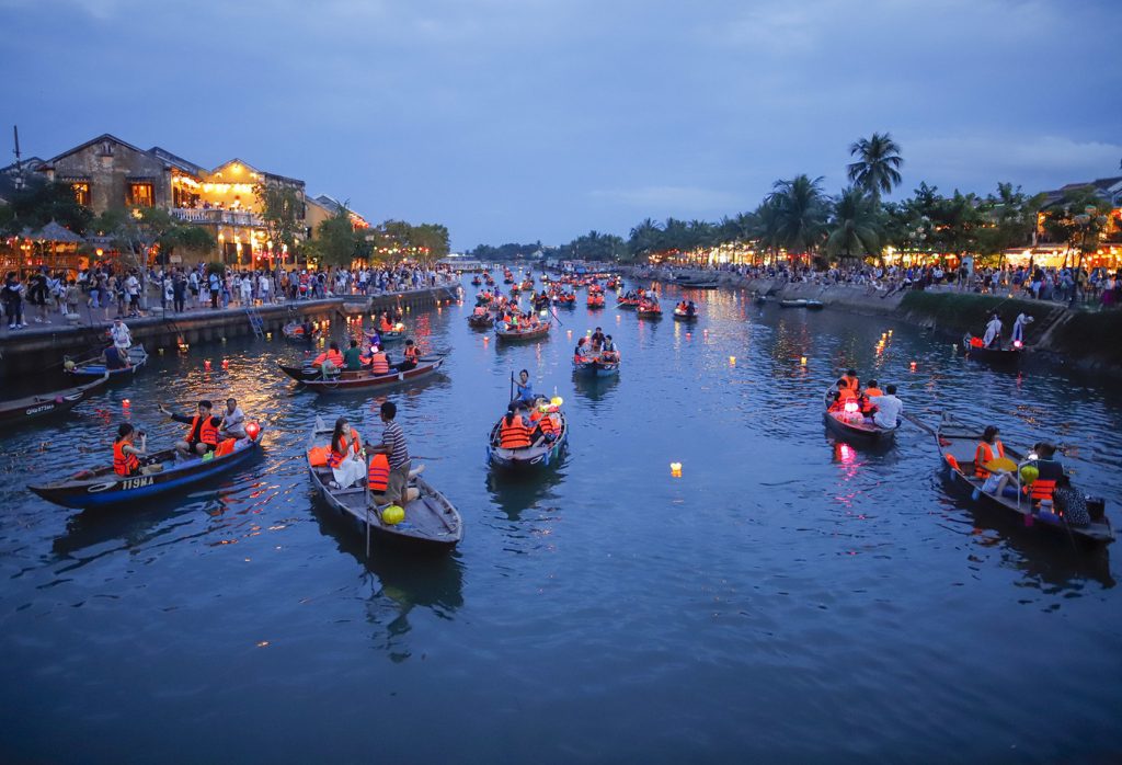 Take a boat trip and release lanterns on the Hoai River.