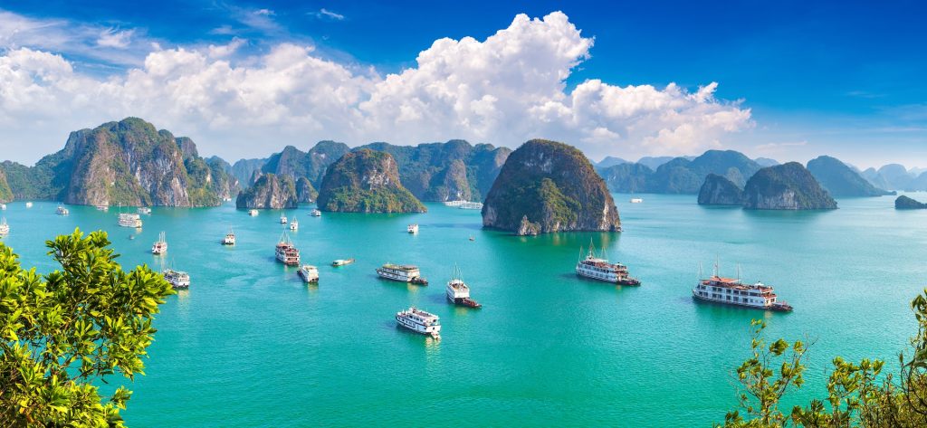 Vietnam nature Ha Long Bay limestone karsts emerald water junk boat