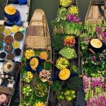 Floating markets are a dawn affair, where boat to boat trading reaches its peak at sunrise before largely fading away by mid morning.