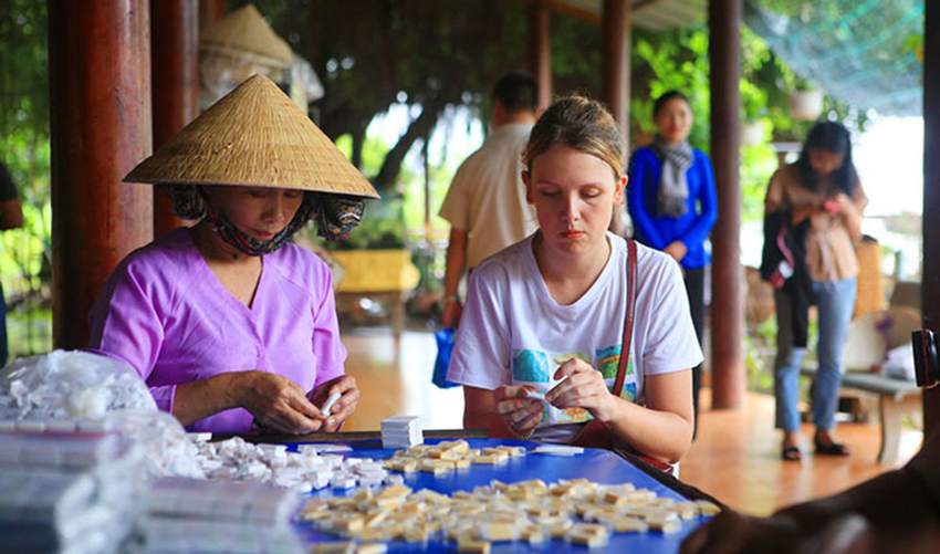 Visit a local coconut candy workshop