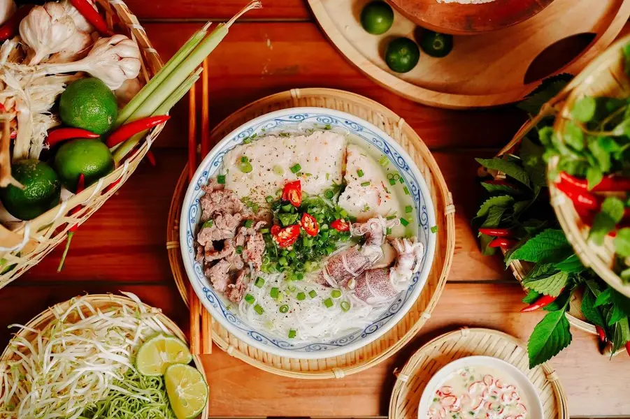 Bún quậy (a unique, interactive noodle soup where you mix your own seasoning)