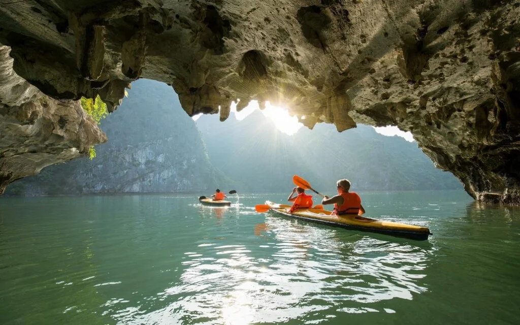 Glide through emerald waters in Halong Bay