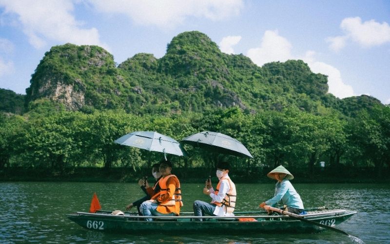 A quieter side of Northern Vietnam, where boats wind through limestone mountains and green valleys.